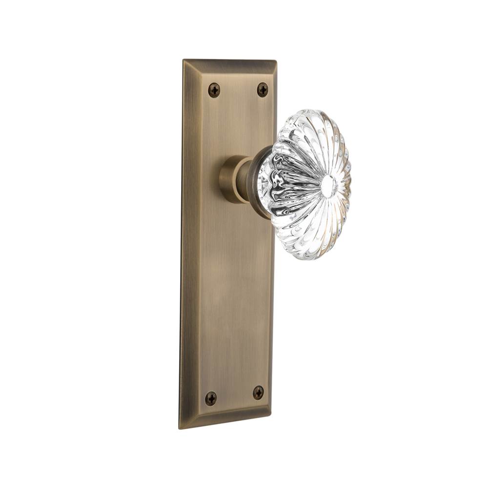 Nostalgic Warehouse Nostalgic Warehouse New York Plate Passage Oval Fluted Crystal Glass Door Knob in Antique Brass